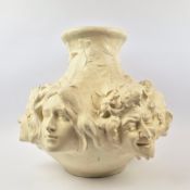 AN ART NOUVEAU GOLDSCHEIDER STYLE 'MASQUES' VASE.