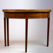 A GEORGE III MAHOGANY TEA TABLE.
