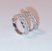 A PAIR OF 18CT WHITE GOLD DIAMOND SET EARRINGS. (2).