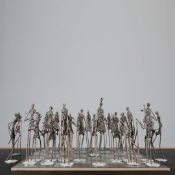 GIACOMETTI STYLE CHESS SET.