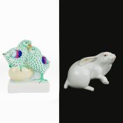 A SMALL HEREND PORCELAIN RABBIT AND CHICKS ON EGG. (2).