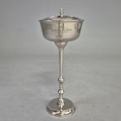 POLISHED METAL FOUR BOTTLE WINE COOLER ON STAND.