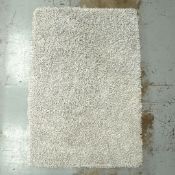 GREY SUEDE SHAGPILE RUG.
