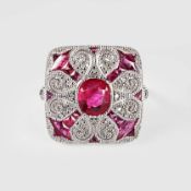 A PLATINUM ART DECO PANEL RUBY AND DIAMOND PANEL RING.