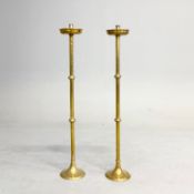 PAIR OF ECCLESIASTICAL FLOOR STANDING BRASS CANDLESTICKS.