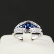 AN 18CT WHITE GOLD ART DECO STYLE SAPPHIRE AND DIAMOND RING.