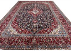 FINE PERSIAN BLUE KASHAN CARPET.