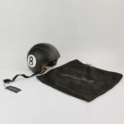 A VESPISMO 8-BALL LEATHER-CLAD OPEN-FACE HELMET.