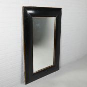 ANDREW MARTIN WALL MIRROR WITH A BLACK PAINTED FRAME.