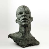 BRONZE BUST IN THE MANNER OF GIACOMETTI.