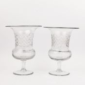 A PAIR OF CUT GLASS URN VASES. (2).