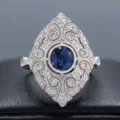 A PLATINUM SAPPHIRE AND DIAMOND DRESS RING.