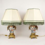 A PAIR OF 19TH CENTURY JAPANESE IMARI LAMPS. (2).