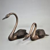 CAST METAL SWAN SCULPTURES (2).