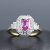 AN 18CT GOLD PINK SAPPHIRE AND DIAMOND SET DRESS RING.