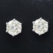 A PAIR OF PLATINUM DIAMOND SOLITAIRE STUD EARRINGS.
