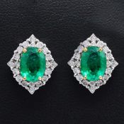 PAIR OF 14CT WHITE GOLD EMERALD AND DIAMOND STUD EARRINGS.