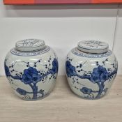 CHINESE EXPORT STYLE BLUE AND WHITE CERAMIC GINGER JARS, A PAIR.