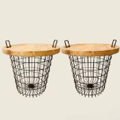 A PAIR OF LOG BASKETS WITH REMOVABLE WOODEN TRAY TOPS.