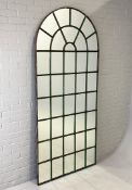 ARCHED GARDEN MIRROR.