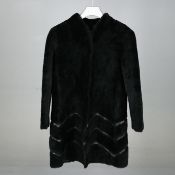 ARMANI. BLACK SHEARLING COAT.