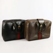TWO GUCCI LEATHER TRAVEL BAGS.