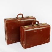 GRADUATED SET OF WARREN SUITCASES. (2).