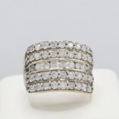 A 9CT GOLD DIAMOND SET DRESS RING.