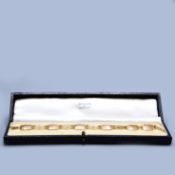 A 9CT GOLD ART DECO BRACELET.