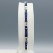 AN 18CT WHITE GOLD SAPPHIRE AND DIAMOND BRACELET.