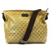GUCCI. MONOGRAM BEIGE/BROWN MESSENGER BAG.