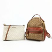 A MICHAEL KORS SHOULDER BAG AND A COACH BACKPACK.