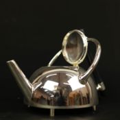 SET OF THREE DRESSER STYLE POLISHED METAL TEAPOTS.