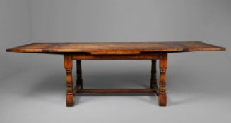 JACOBEAN STYLE OAK DRAWLEAF TABLE.