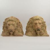 ATTRIBUTED TO THEODORE ALEXANDER. TERRACOTTA LION HEAD BOOKENDS.