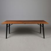 WOUD SPLIT DINING TABLE BY SAYS WHO IN ASH AND METAL.