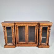 WILLIAM IV ROSEWOOD INVERTED BREAKFRONT BOOKCASE.