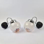 PAIR OF 1970s ITALIAN MAZZEGA WALL LIGHTS ON CURVED CHROME SUPPORTS.
