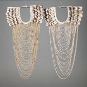 FAUX WALL MOUNTED ETHNIC NECKLACE DISPLAYS, A PAIR.