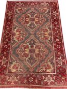 ANTIQUE PERSIAN RUG.