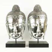 BUSTS OF BUDDAH, A PAIR.