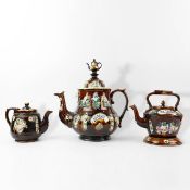 THREE VICTORIAN BARGEWARE TEAPOTS. (3).