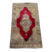 FINE PURE SILK PERSIAN QUM RUG.