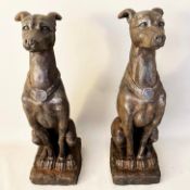 PAIR OF FAUX STONE DOGS.