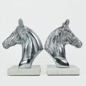 CONTEMPORARY SCHOOL SCULPTURAL STALLION BUSTS, A PAIR.