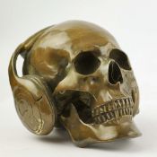 CONTEMPORARY SCHOOL DJ SKULL SCULPTURE.
