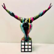 CONTEMPORARY DIVER SCULPTURE IN POLYCHROME PAINT FINISH.