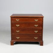 A GEORGE III STYLE MAHOGANY CHEST OF DRAWERS.