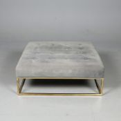 FOOTSTOOL WITH BUTTONED GREY VELVET UPHOLSTERY ON A GILT METAL BASE.