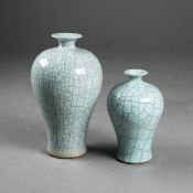 GUAN KILN STYLE PLUM VASES, A GRADUATED PAIR.